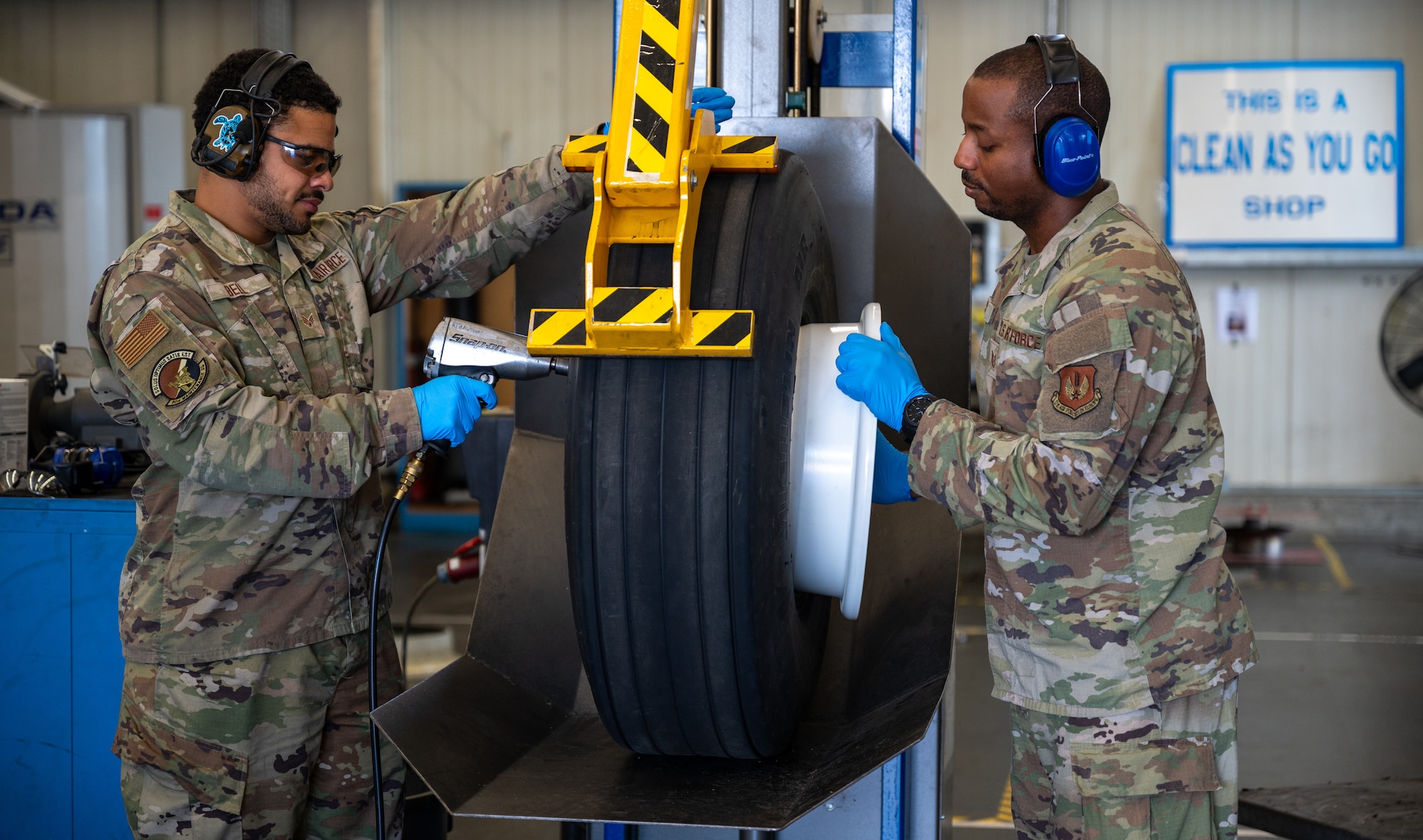 U.S. Air Force Senior Airman Montez Bell, 86th Maintenance Squadron repair and reclamation journeyman, and Tech. Sgt. Christopher Smith, 86th MXS noncommissioned officer in charge of the Wheel and Tire Shop, dismantle a C-130J Super Hercules nose wheel assembly at Ramstein Air Base, Germany, Oct. 1, 2025. The Wheel and Tire Shop ensures that every C-130J aircraft wheel assembly meets strict safety standards vital to Ramstein’s airlift operations. (U.S. Air Force photo by Senior Airman Jared Lovett)