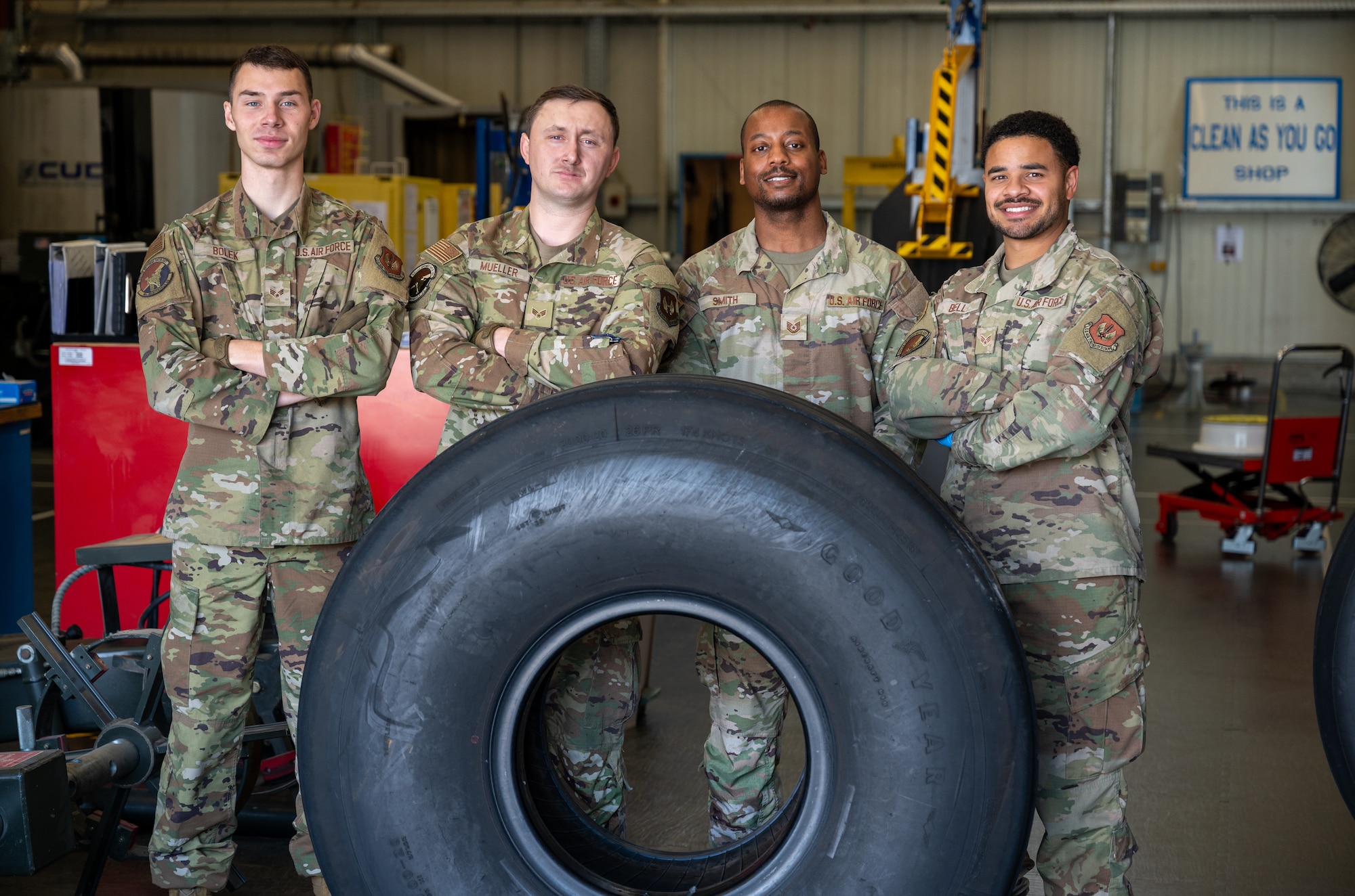 U.S. Air Force Airmen assigned to the 86th Maintenance Squadron, pose for a photo at the Wheel and Tire Shop at Ramstein Air Base, Germany, Oct. 1, 2025. Despite being only a four-person team, the Wheel and Tire Shop repairs an average of 136 C-130J Super Hercules wheels each year, ensuring aircraft remain mission-ready to support operations across Europe and Africa. (U.S. Air Force photo by Senior Airman Jared Lovett)