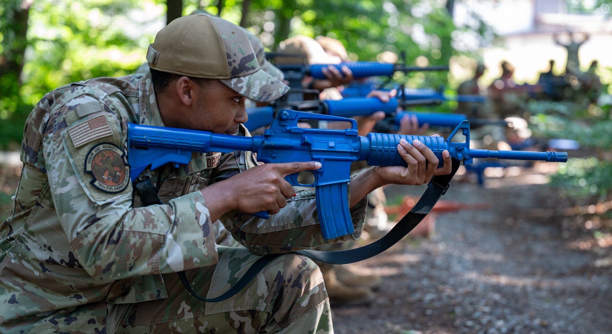 U.S. Air Force Airman 1st Class David Hudson, 786th Civil Engineer Squadron heating, ventilation and air conditioning technician, does weapons drills during Prime Base Engineer Emergency Force training at Ramstein Air Base, Germany, July 17, 2025. The 86th Civil Engineer Group supports the largest American military community outside of the United States, maintaining the buildings and infrastructure on multiple military installations within the Kaiserslautern Military Community. The 86th CEG plays a critical role in mission success by laying the foundation to support Airmen and their families. (U.S. Air Force photo by Senior Airman Jared Lovett)