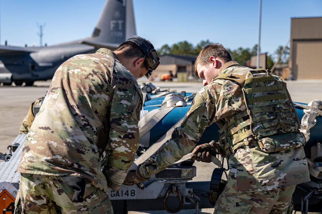 U.S. Air Force Airmen assigned to the 23d Wing board an HC-130J Combat King II to establish a simulated contingency location in support of exercise Mosaic Tiger 26-1.
