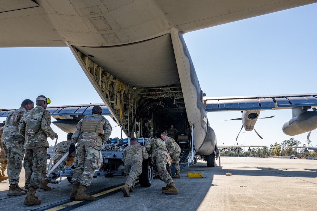 U.S. Air Force Airmen assigned to the 23d Wing board an HC-130J Combat King II to establish a simulated contingency location in support of exercise Mosaic Tiger 26-1.