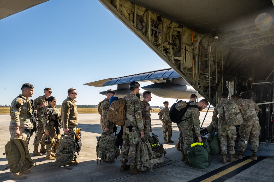 U.S. Air Force Airmen assigned to the 23d Wing board an HC-130J Combat King II to establish a simulated contingency location in support of exercise Mosaic Tiger 26-1.