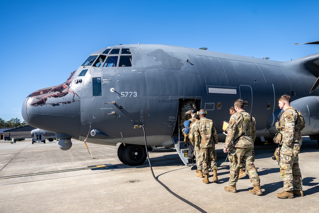U.S. Air Force Airmen assigned to the 23d Wing board an HC-130J Combat King II to establish a simulated contingency location in support of exercise Mosaic Tiger 26-1.