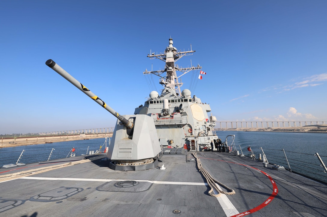 SUEZ CANAL (Nov. 13, 2025) The Arleigh Burke-class guided-missile destroyer USS Roosevelt (DDG 80) passes the Friendship Bridge during a Suez Canal transit in the U.S. Central Command (CENTCOM) area of responsibility. Roosevelt is deployed to the U.S. 5th Fleet area of operations to support maritime security and stability in the CENTCOM area of responsibility. (U.S. Navy photo by Mass Communication Specialist 1st Class Indra Beaufort)