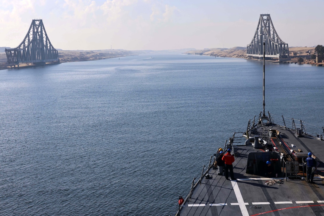 SUEZ CANAL (Nov. 13, 2025) The Arleigh Burke-class guided-missile destroyer USS Roosevelt (DDG 80) transits the Suez Canal in the U.S. Central Command (CENTCOM) area of responsibility. Roosevelt is deployed to the U.S. 5th Fleet area of operations to support maritime security and stability in the CENTCOM area of responsibility. (U.S. Navy photo by Mass Communication Specialist 1st Class Indra Beaufort)