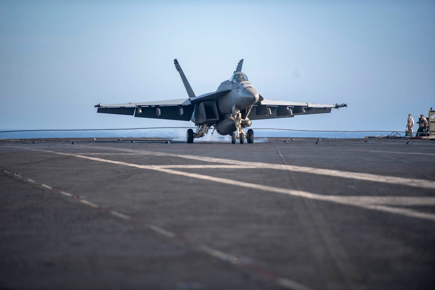 Super Hornet fighter jet landing on USS Dwight D. Eisenhower (CVN-69) aircraft carrier