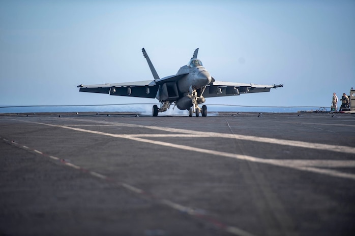 Super Hornet fighter jet landing on USS Dwight D. Eisenhower (CVN-69) aircraft carrier