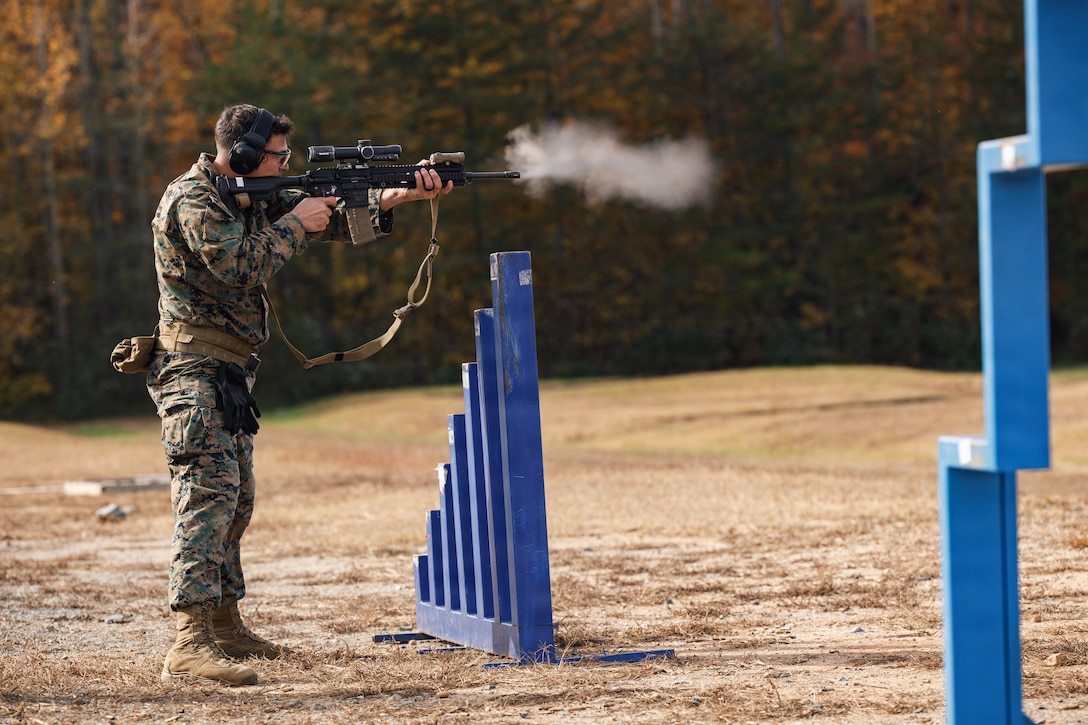 U.S. Marine Corps Lance Cpl. Kareem Saleh, a supply chain specialist with The Basic School, Training Command, shoots an M27 Infantry Automatic Rifle during the individual match at the Marine Corps Marksmanship Competition - National Capital Region, on Marine Corps Base Quantico, Virginia, Nov. 4, 2025. The MCMC-NCR, held annually, emphasizes the Corps’ longstanding tradition of marksmanship excellence, with Marines stationed in the NCR invited to compete and sharpen their combat effectiveness through advanced training tactics in both day and night events. (Marine Corps photo by Cpl. Joshua Barker)