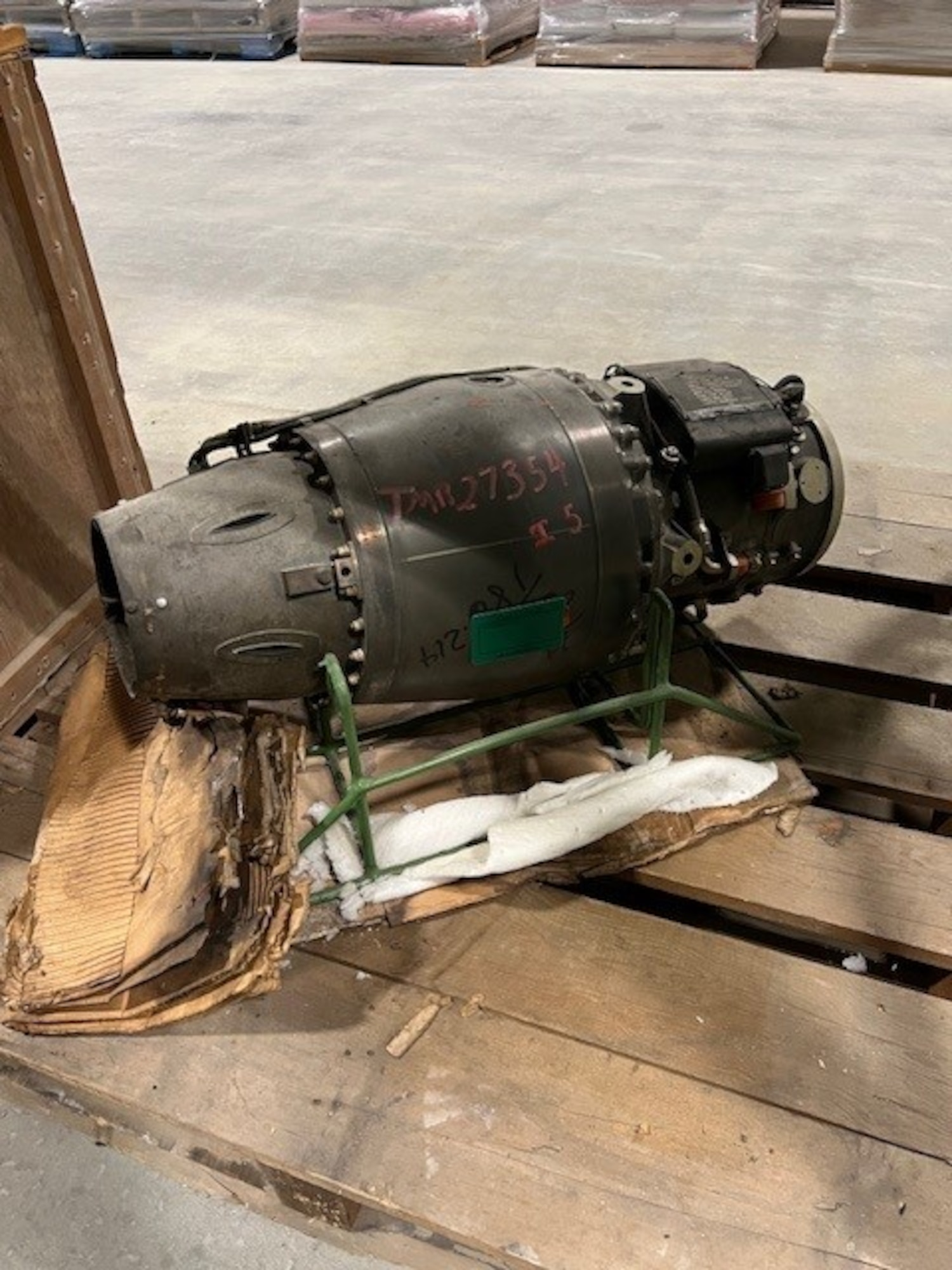 A drone engine from the 1980s is pictured unboxed in a warehouse at Arnold Air Force Base, Tenn. This motor and several aircraft canopies stored in the warehouse since the late 1980s to early 1990s were shipped this summer to the Air Force Materiel Command History and Heritage Directorate for possible display. (Courtesy photo)