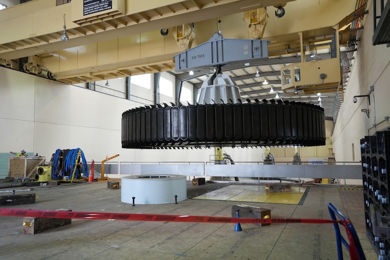 Andritz contractors lower a massive rotor to be set aside, making way for the installation of a new turbine as part of the turbine generator rehabilitation project at Old Hickory Powerhouse on the Cumberland River. The rotor weighs 504,000 pounds. Sept. 3, 2025.