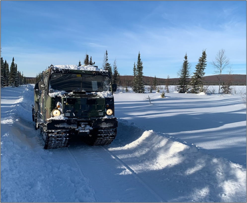 Photo of a Small Unit Support Vehicle (SUSV) on a winter road in Alaska.

ERDC’s Cold Regions Research and Engineering Laboratory (CRREL) is providing crucial guidance on building and maintaining the vital, yet unpredictable, winter roads in challenging northern environments.  (Image by Josh Buzby, Integrated Training Area Management coordinator US Army Alaska. Used with permission.)