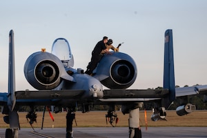U.S. Air Force Airmen perform maintenance on an A-10C Thunderbolt II during exercise Mosaic Tiger 26-1 at Moody Air Force Base, Ga., Nov. 17, 2025. The exercise strengthens Agile Combat Employment capabilities by training maintainers to sustain aircraft operations with limited resources in contested environments. (U.S. Air Force photo by Senior Airman Iain Stanley)