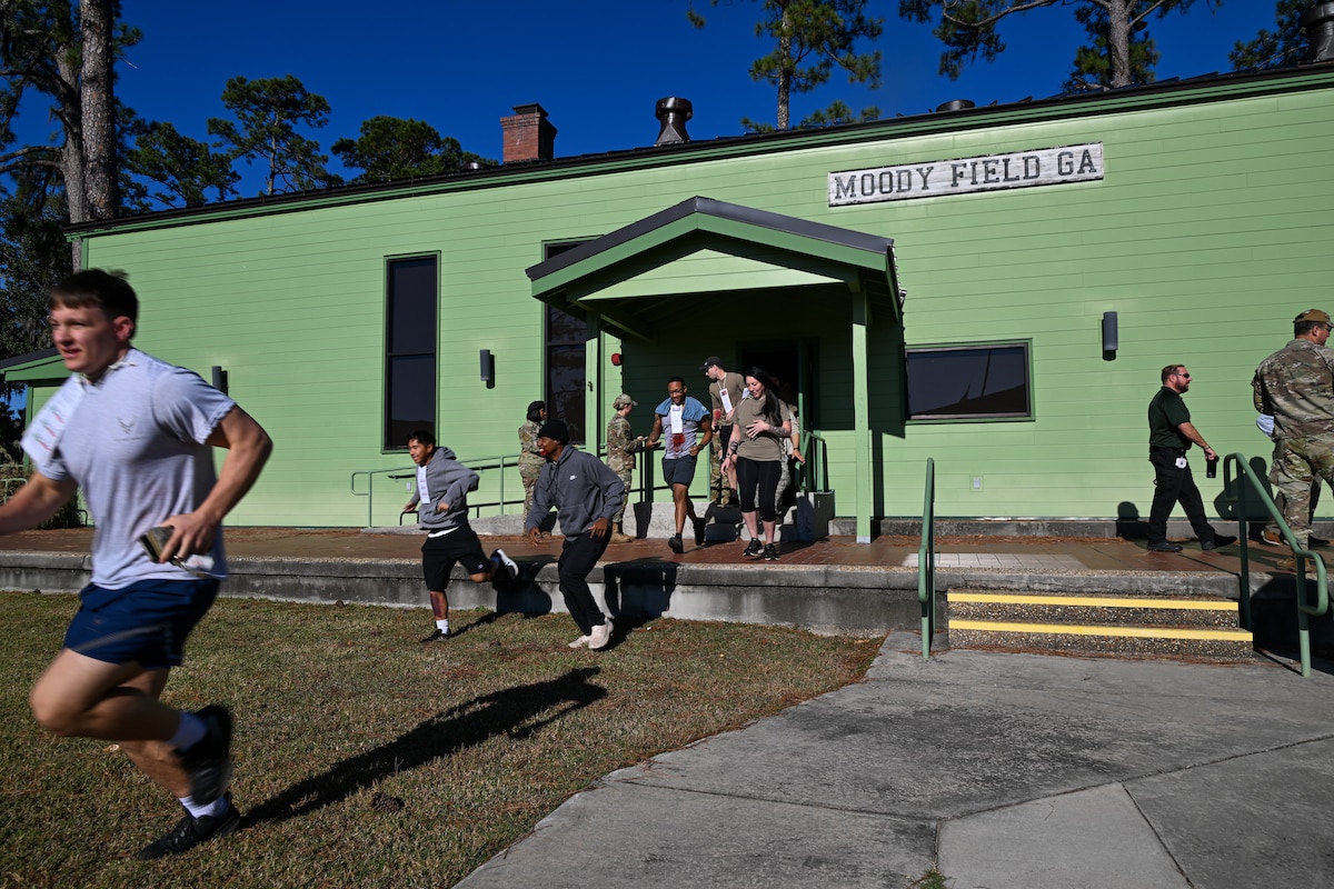 U.S. Air Force Staff Sgt. Keneisha Osborne, 23d Medical Operations Squadron group training manager, has a moulage wound applied in preparation for an active-shooter exercise at Moody Air Force Base, Georgia, Nov. 17, 2025. Medical staff applied realistic wounds to nearly 30 Airmen to test first-responders in securing the threat and rendering first aid to members in order of criticality.