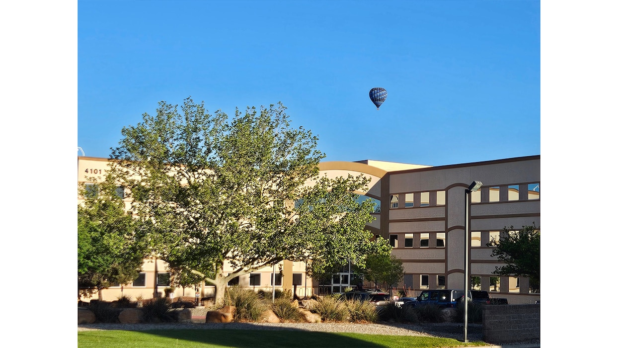 A hot air balloon floats over the USACE-Albuquerque District Office the morning of April 24, 2025. Photo by Keith Winemiller.