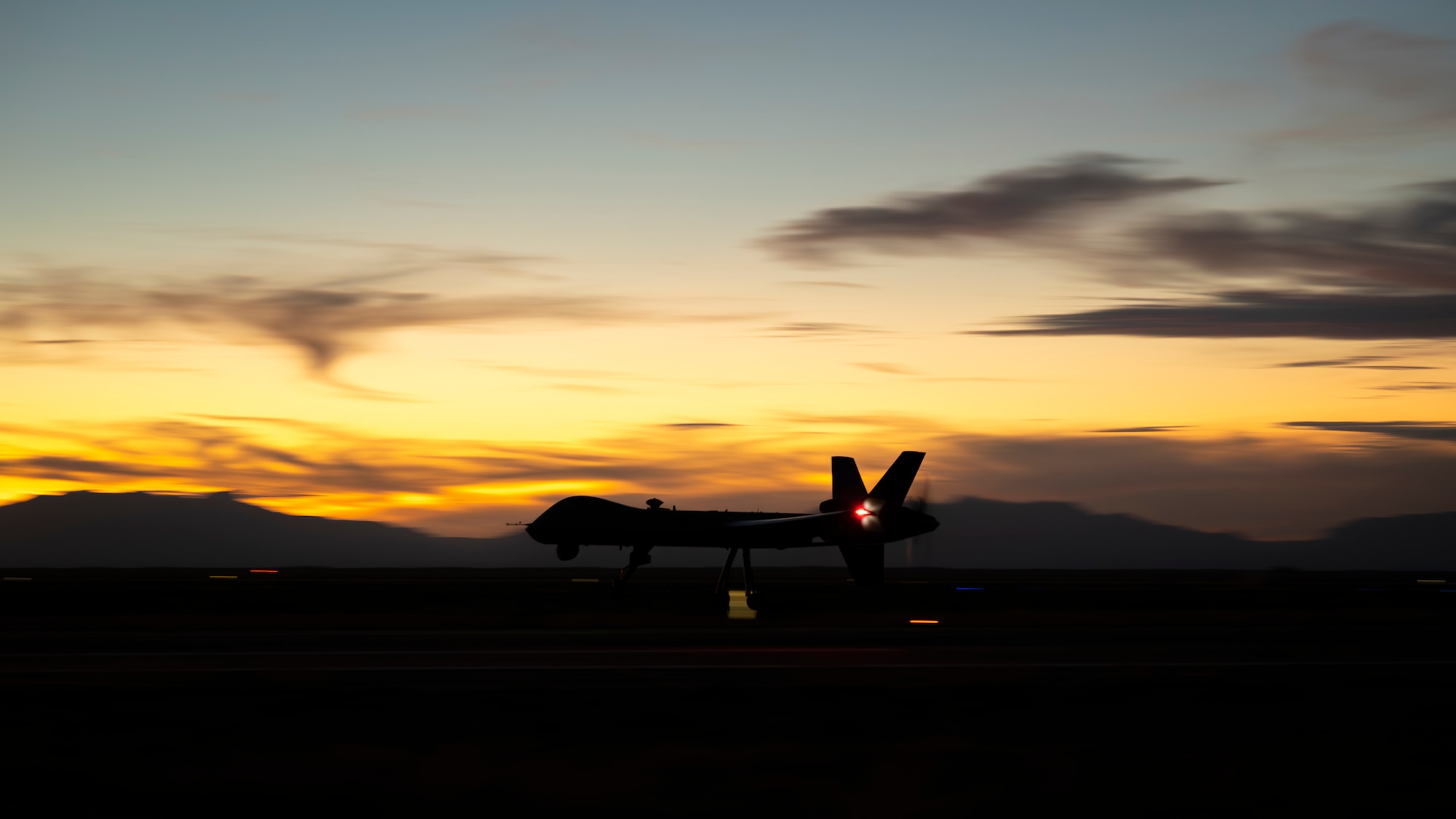 An MQ-9 Reaper assigned to the 49th Operations Group lands after completing a training sortie at Holloman Air Force Base, New Mexico, Nov. 13, 2025. The 49th OG is responsible for training the majority of the Air Force’s MQ-9 pilots and sensor operators in addition to assisting other branches, such as the U.S. Marine Corps, and NATO allies with their own Reaper training programs. (U.S. Air Force photo by Tech. Sgt. Victor J. Caputo)