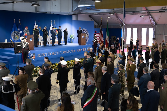 Adm. George M. Wikoff, Commander, U.S. Naval Forces Europe and Africa (NAVEUR/NAVAF), center,  and official party render a solute during a change of command ceremony held at Allied Joint Force Command (JFC) Naples, Nov. 19, 2025. For more than 80 years, NAVEUR/NAVAF has forged strategic relationships with Allies and partners, leveraging a foundation of shared values to share the duties of preserving security and stability. (U.S. Army photo by Master Sergeant Ryan Hohman)