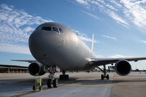 A KC-46A Pegasus sits on the flight line at Joint Base McGuire-Dix-Lakehurst, N.J., Nov. 18, 2025. Eight KC-46As will replace all KC-135 Stratotankers, bringing enhanced capabilities, such as boom and drogue defueling on the same sortie, worldwide navigation and communication, cargo capacity on the entire main deck floor, receiver air refueling, improved force protection, and multi-point air refueling capability. (U.S. Air Force photo by Senior Airman Aidan Thompson)
