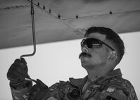 Senior Airman John Richters, 96th Bomb Squadron crew chief, performs maintenance on B-52H Stratofortress assigned to the 2nd Operations Group, Barksdale Air Force Base, Louisiana, as part of Exercise Global Thunder 26 at Minot Air Force Base, North Dakota, Oct. 19, 2025. Global Thunder is an annual command and control exercise designed to train U.S. Strategic Command forces and assess joint operational readiness. (U.S. Air Force photo by Senior Airman Kyle Wilson)