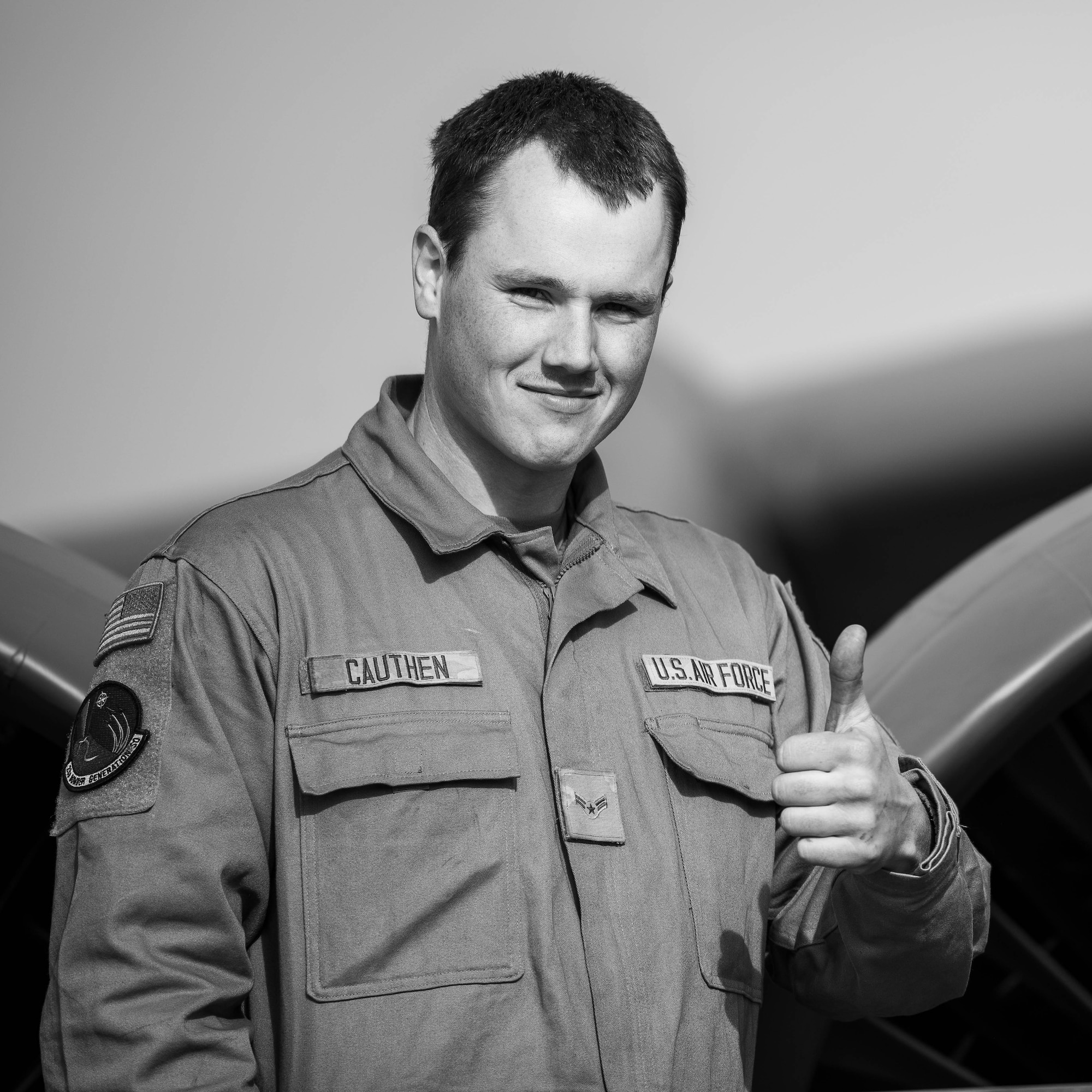 Airman 1st Class Sean Cauthen, 23rd Bomber Generation Squadron crew chief, gives a thumbs-up as part of Exercise Global Thunder 26 at Minot Air Force Base, North Dakota, Oct. 19, 2025. Global Thunder is an annual command and control exercise designed to train U.S. Strategic Command forces and assess joint operational readiness. (U.S. Air Force photo by Senior Airman Kyle Wilson)