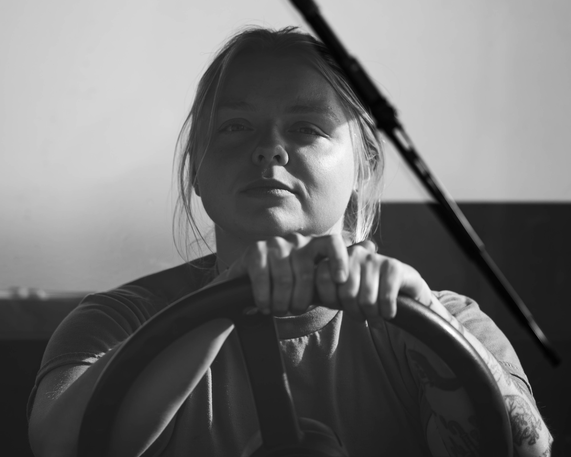 Airman 1st Class Haylie Allen, 69th Bomber Generation Squadron crew chief, performs towing operations as part of Exercise Global Thunder 26 at Minot Air Force Base, North Dakota, Oct. 19, 2025. Global Thunder is an annual command and control exercise designed to train U.S. Strategic Command forces and assess joint operational readiness. (U.S. Air Force photo by Senior Airman Kyle Wilson)