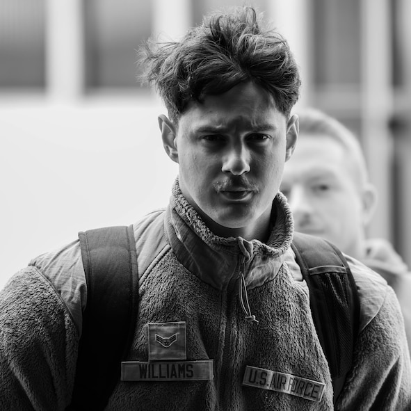 Airman 1st Class Bryce Williams, 2nd Operations Support Squadron aircrew flight equipment technician, attends an in-processing briefing as part of Exercise Global Thunder 26 at Minot Air Force Base, North Dakota, Oct. 20, 2025. Global Thunder is an annual command and control exercise designed to train U.S. Strategic Command forces and assess joint operational readiness. (U.S. Air Force photo by Senior Airman Kyle Wilson)