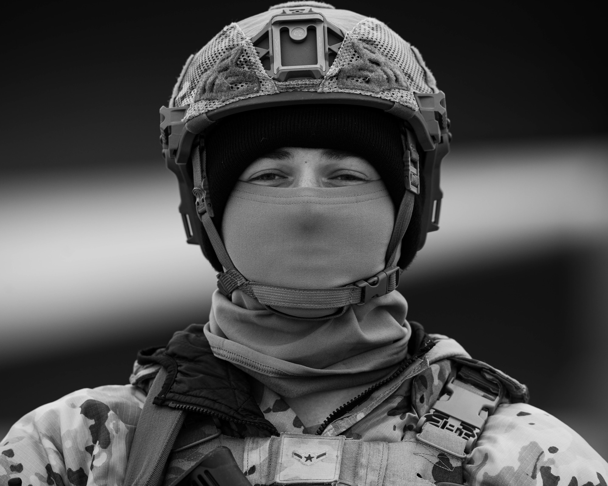 Airman Cash Jones, 5th Security Forces Squadron defender, stands guard on the flightline as part of Exercise Global Thunder 26 at Minot Air Force Base, North Dakota, Oct. 21, 2025. Global Thunder is an annual command and control exercise designed to train U.S. Strategic Command forces and assess joint operational readiness. (U.S. Air Force photo by Senior Airman Kyle Wilson)