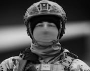 Airman Cash Jones, 5th Security Forces Squadron defender, stands guard on the flightline as part of Exercise Global Thunder 26 at Minot Air Force Base, North Dakota, Oct. 21, 2025. Global Thunder is an annual command and control exercise designed to train U.S. Strategic Command forces and assess joint operational readiness. (U.S. Air Force photo by Senior Airman Kyle Wilson)