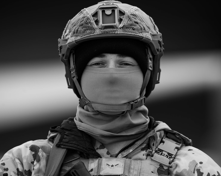Airman Cash Jones, 5th Security Forces Squadron defender, stands guard on the flightline as part of Exercise Global Thunder 26 at Minot Air Force Base, North Dakota, Oct. 21, 2025. Global Thunder is an annual command and control exercise designed to train U.S. Strategic Command forces and assess joint operational readiness. (U.S. Air Force photo by Senior Airman Kyle Wilson)