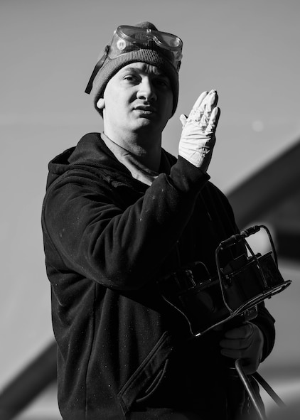 Senior Airman Shane Mickolick, 5th Maintenance Group weapons loader, instructs his team as part of Exercise Global Thunder 26 at Minot Air Force Base, North Dakota, Oct. 22, 2025. Global Thunder is an annual command and control exercise designed to train U.S. Strategic Command forces and assess joint operational readiness. (U.S. Air Force photo by Senior Airman Kyle Wilson)