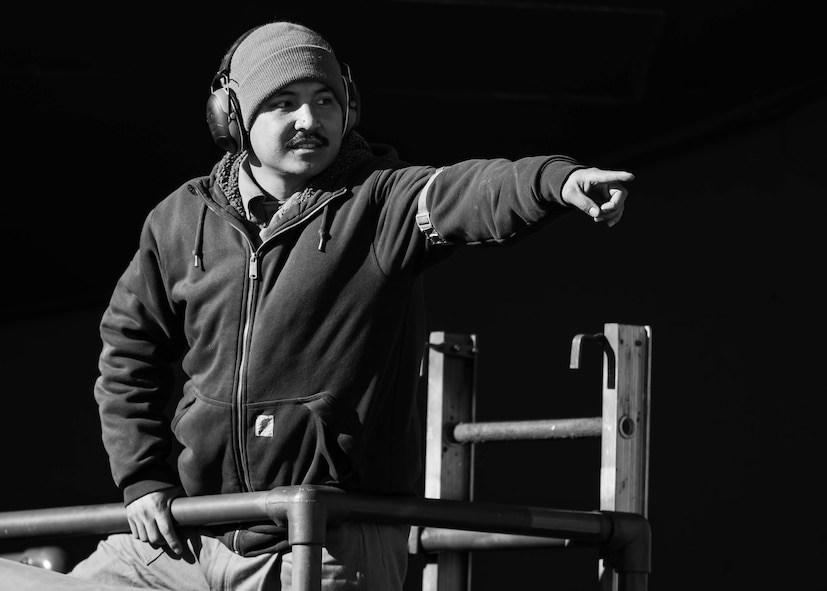 U.S. Air Force Staff Sgt. Stanley Parong, 5th Maintenance Group weapons loader, instructs his team as part of Exercise Global Thunder 26 at Minot Air Force Base, North Dakota, Oct. 22, 2025. Global Thunder is an annual command and control exercise designed to train U.S. Strategic Command forces and assess joint operational readiness. (U.S. Air Force photo by Senior Airman Kyle Wilson)