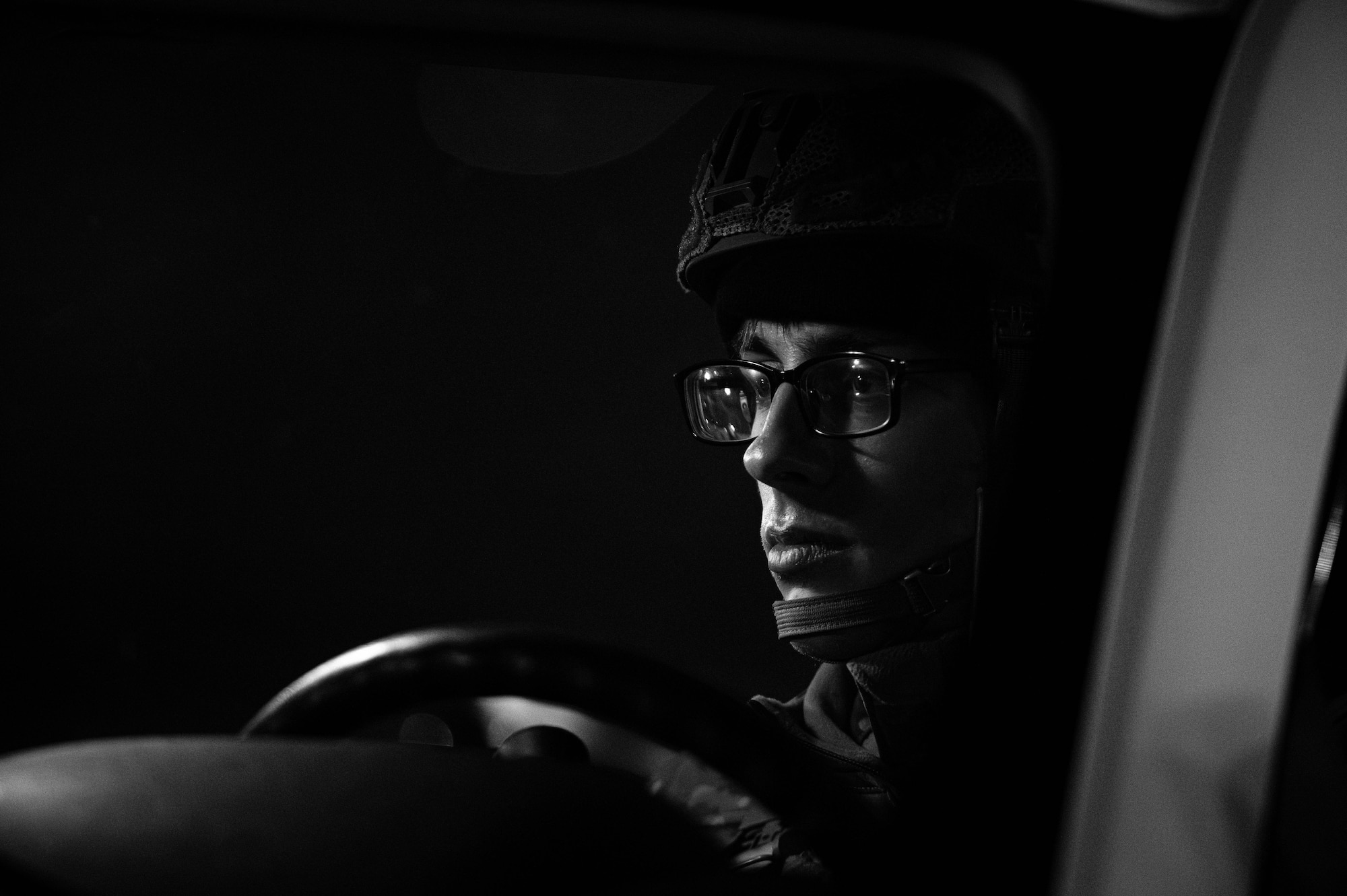 A Defender assigned to the 5th Security Forces Squadron guards the flightline as part of Exercise Global Thunder 26 at Minot Air Force Base, North Dakota, Oct. 23, 2025. Global Thunder is an annual command and control exercise designed to train U.S. Strategic Command forces and assess joint operational readiness. (U.S. Air Force photo by Senior Airman Alyssa Bankston)