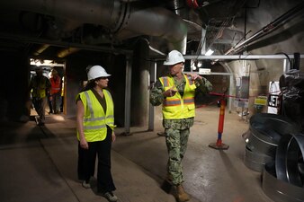 Rear Adm. Marc Williams, deputy commander, Navy Closure Task Force-Red Hill (NCTF-RH), speaks with Rosana Weldon, director, University of Hawaii Red Hill Registry, during a site visit to the Red Hill Bulk Fuel Storage Facility (RHBFSF) in Honolulu, Sept. 26, 2025. Charged with the safe decommissioning of the RHBFSF, NCTF-RH was established by the Department of the Navy as a commitment to the community and the environment. NCTF-RH continues to engage with the people of Hawaii, regulatory agencies, and other stakeholders as it safely and deliberately decommissions the facility. (U.S. Navy photo by Mass Communication Specialist 3rd Class Krystal Diaz)