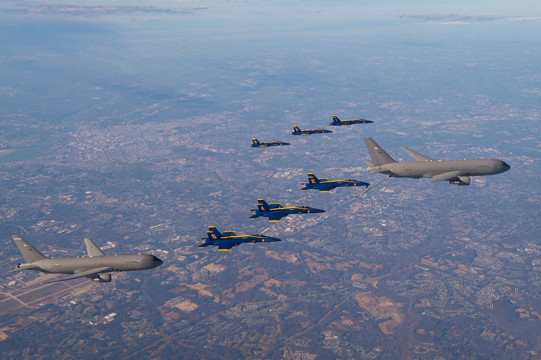 U.S. Navy Flight Demonstration Squadron, the Blue Angels, and two U.S. Air Force KC-46 aircraft assigned to the 157th Air Refueling Wing, New Hampshire National Guard and 22nd Air Refueling Wing, fly in formation during a refueling evolution while in transit for the 2020 Army-Navy Game.