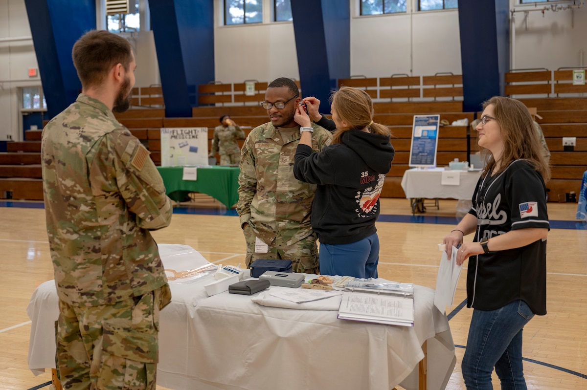 A U.S. Airman assigned to the 35th Fighter Wing (FW) participates in an acupuncture demonstration during the 2025 Health & Wellness Expo at Misawa Air Base, Japan, Nov. 14, 2025. The event supports the 35th FW’s mission by equipping Airmen with tools to optimize performance and sustain readiness. (U.S. Air Force photo by Senior Airman Brittany Russell)