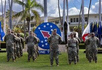 Lt. Col. Joshua Simms, executive officer for the 1st Theater Information Advantage Detachment, stands before the unit at the beginning of the activation ceremony November 7, 2025, at Fort Shafter, Hawaii.