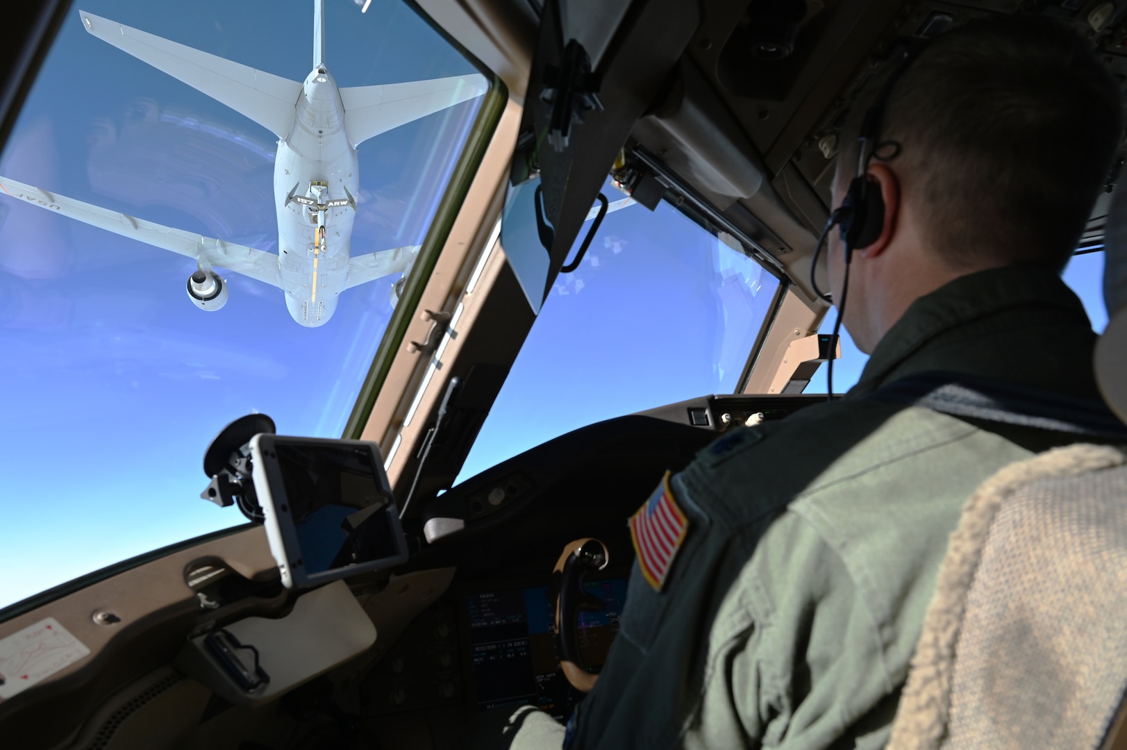 A pilot with the 157th Air Refueling Wing, New Hampshire National Guard, guides his KC-46A Pegasus aircraft as it receives fuel
