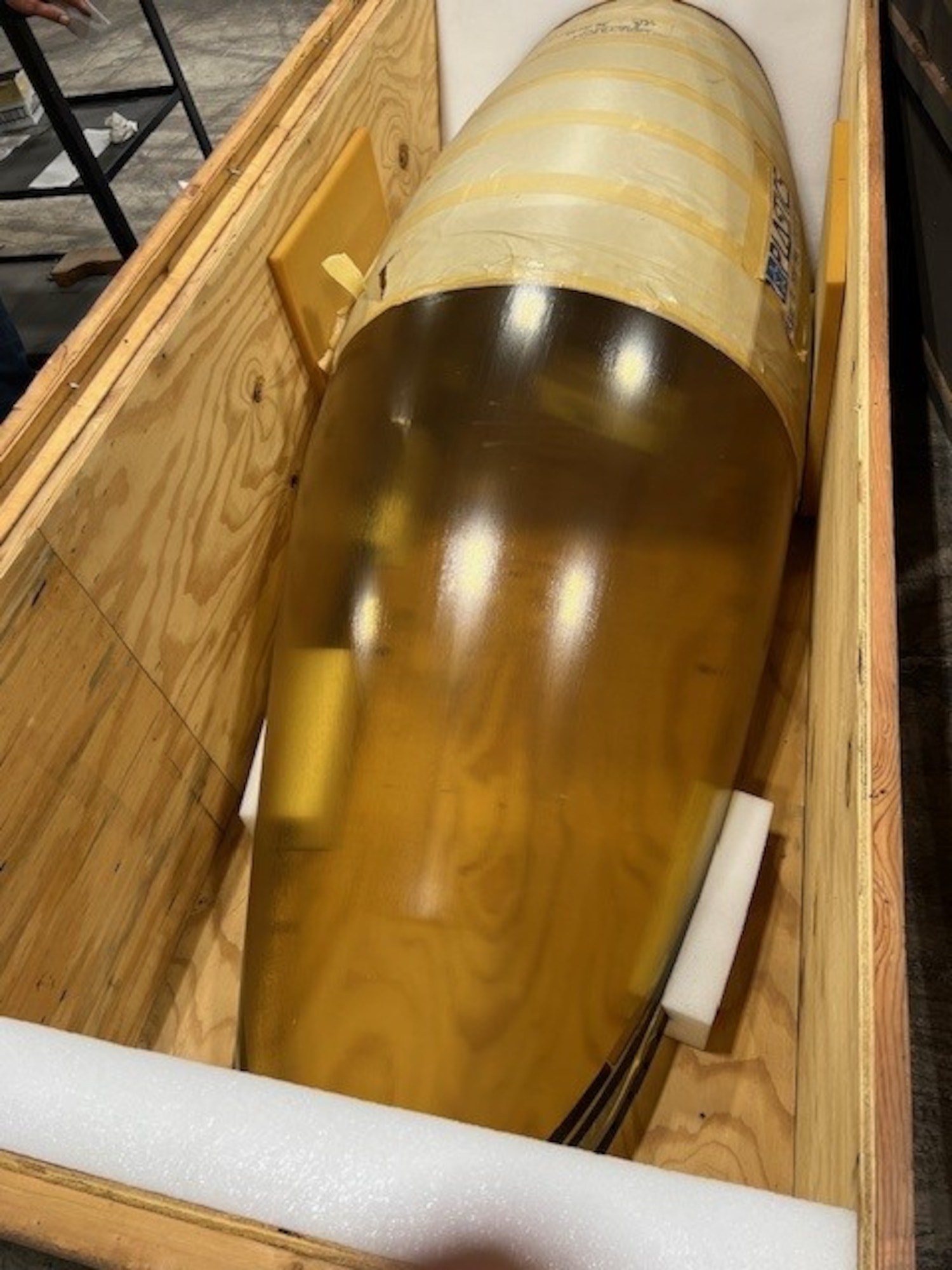 An F-16 Fighting Falcon aircraft canopy is pictured in a warehouse at Arnold Air Force Base, Tenn. It is believed the canopy was slated to be used in bird strike testing at the S-3 Bird Impact Range at Arnold, more famously known as the “Chicken Gun,” but the canopy ended up not being used in such testing. Several canopies and a drone engine from the 1980s stored in the warehouse since the late 1980s to early 1990s were shipped this summer to the Air Force Materiel Command History and Heritage Directorate for possible display. (Courtesy photo)