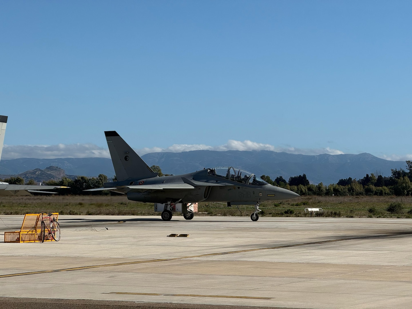 A T-346A Master Jet Trainer taxis on the flight line at the International Flight Training School, Decimomannu Air Base, Italy.