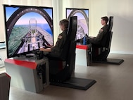 U.S. Air Force student pilots conduct T-346A Master Jet Trainer simulation training during the undergraduate flying training program Small Group Tryout at the International Flight Training School, Decimomannu Air Base, Italy.
