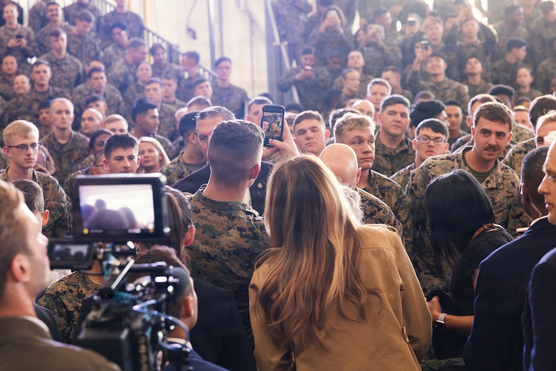 First lady of the United States, Mrs. Melania Trump, greets U.S. service members and their families at Marine Corps Air Station (MCAS) New River in Jacksonville, North Carolina, Nov. 19, 2025. Trump and Mrs. Usha Vance made their first visit to a military installation under the second Trump Administration to show appreciation for military families and those who serve this holiday season. During their visit they spent time with students creating holiday crafts and building care packages for deployed service members. The visit culminated with the two women addressing nearly 1,500 service members and their families at MCAS New River. (U.S. Marine Corps photo by Cpl. Loriann Dauscher)