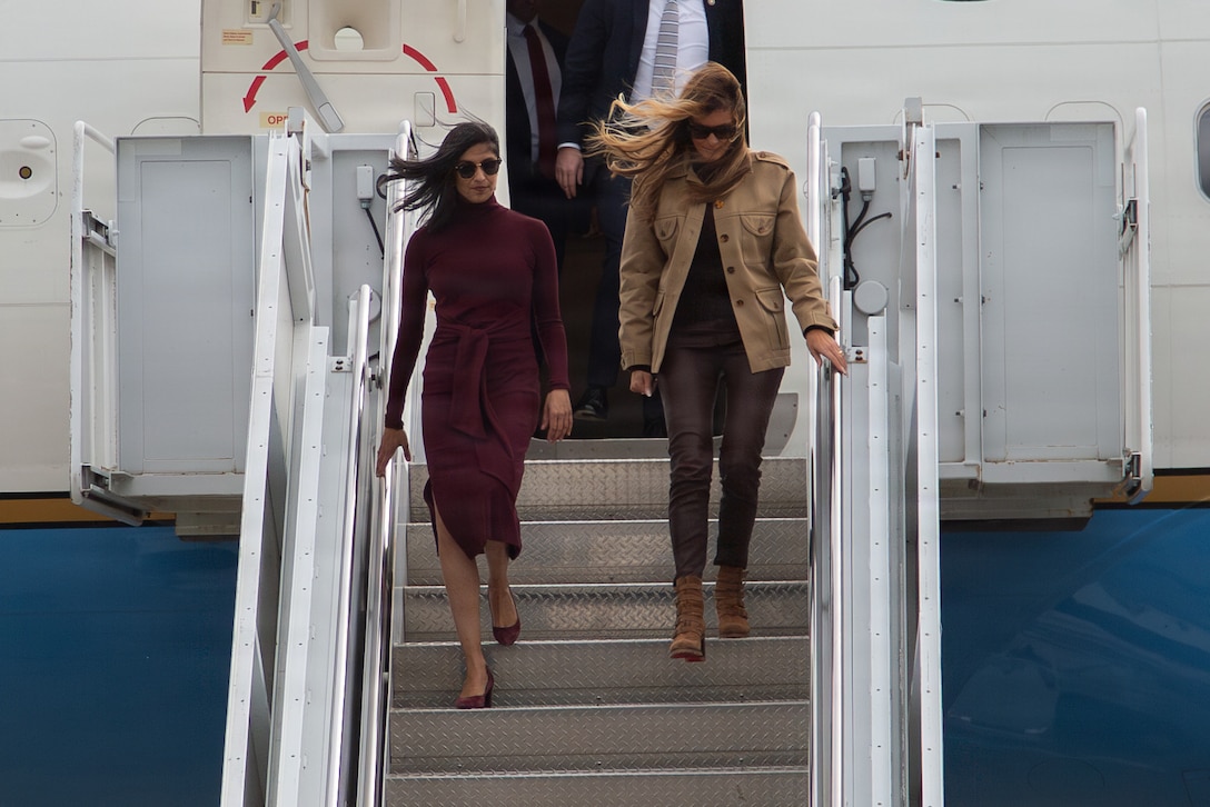 First lady of the United States, Mrs. Melania Trump, and second lady, Mrs. Usha Vance, land at Albert J. Ellis Airport before heading to Marine Corps Base Camp Lejeune North Carolina, Nov. 19, 2025. Trump and Vance made their first visit to a military installation under the second Trump Administration to show appreciation for military families and those who serve this holiday season. During their visit they spent time with students creating holiday crafts and building care packages for deployed service members. The visit culminated with the two women addressing nearly 1,500 service members and their families at MCAS New River. (U.S. Marine Corps photo by Lance Cpl. Grace Kim)
