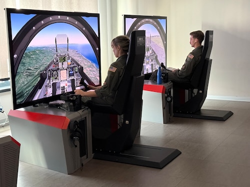 U.S. Air Force student pilots conduct T-346A Master Jet Trainer simulation training during the undergraduate flying training program Small Group Tryout at the International Flight Training School, Decimomannu Air Base, Italy.