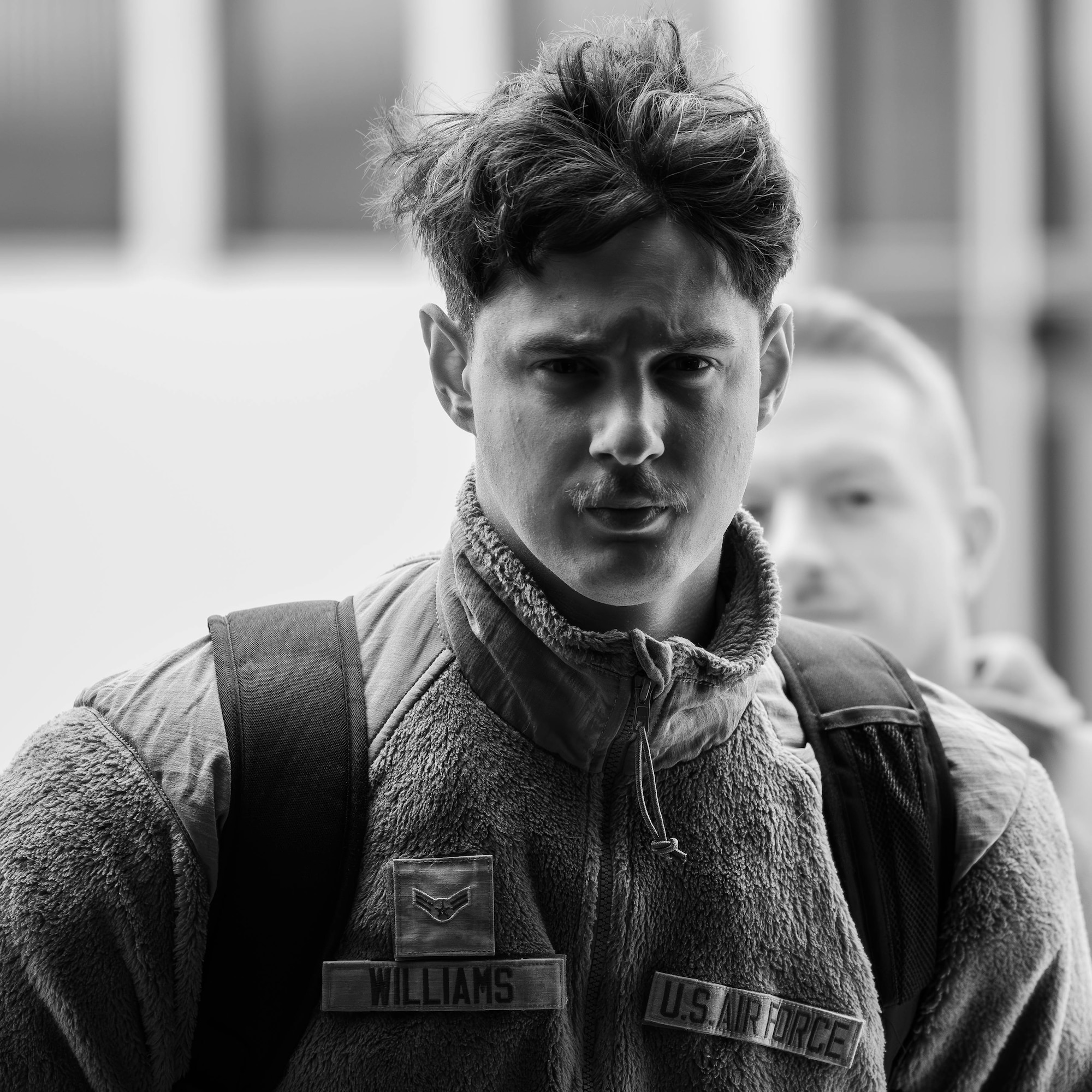 Airman 1st Class Bryce Williams, 2nd Operations Support Squadron aircrew flight equipment technician, attends an in-processing briefing as part of Exercise Global Thunder 26 at Minot Air Force Base, North Dakota, Oct. 20, 2025. Global Thunder is an annual command and control exercise designed to train U.S. Strategic Command forces and assess joint operational readiness. (U.S. Air Force photo by Senior Airman Kyle Wilson)