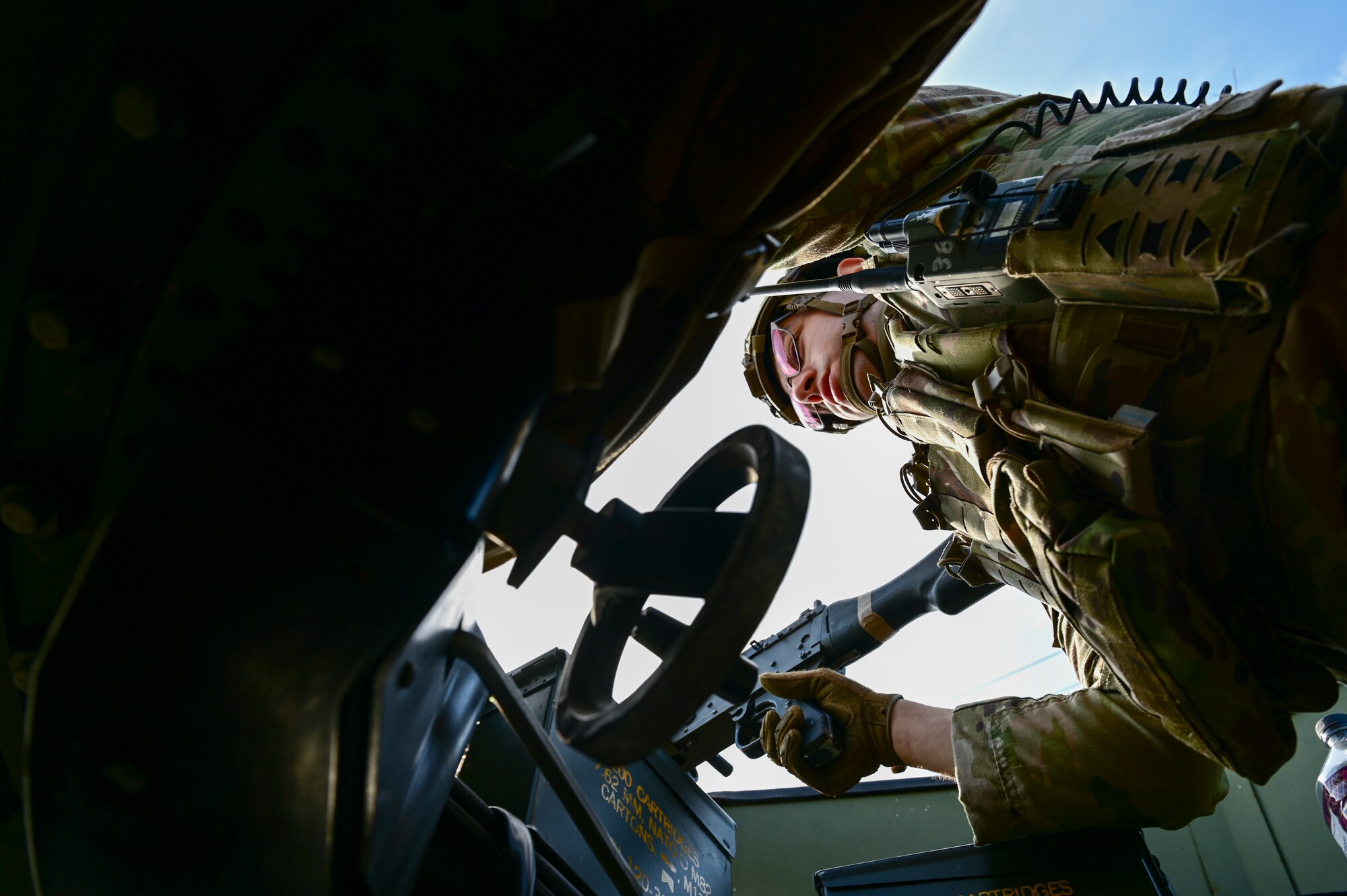 A man holds a weapon.