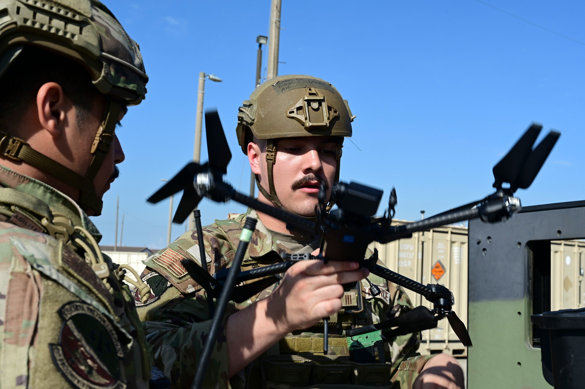 A man holds a drone.