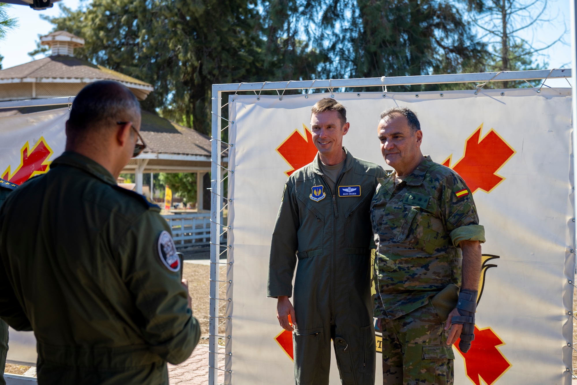 Military members pose for a photo