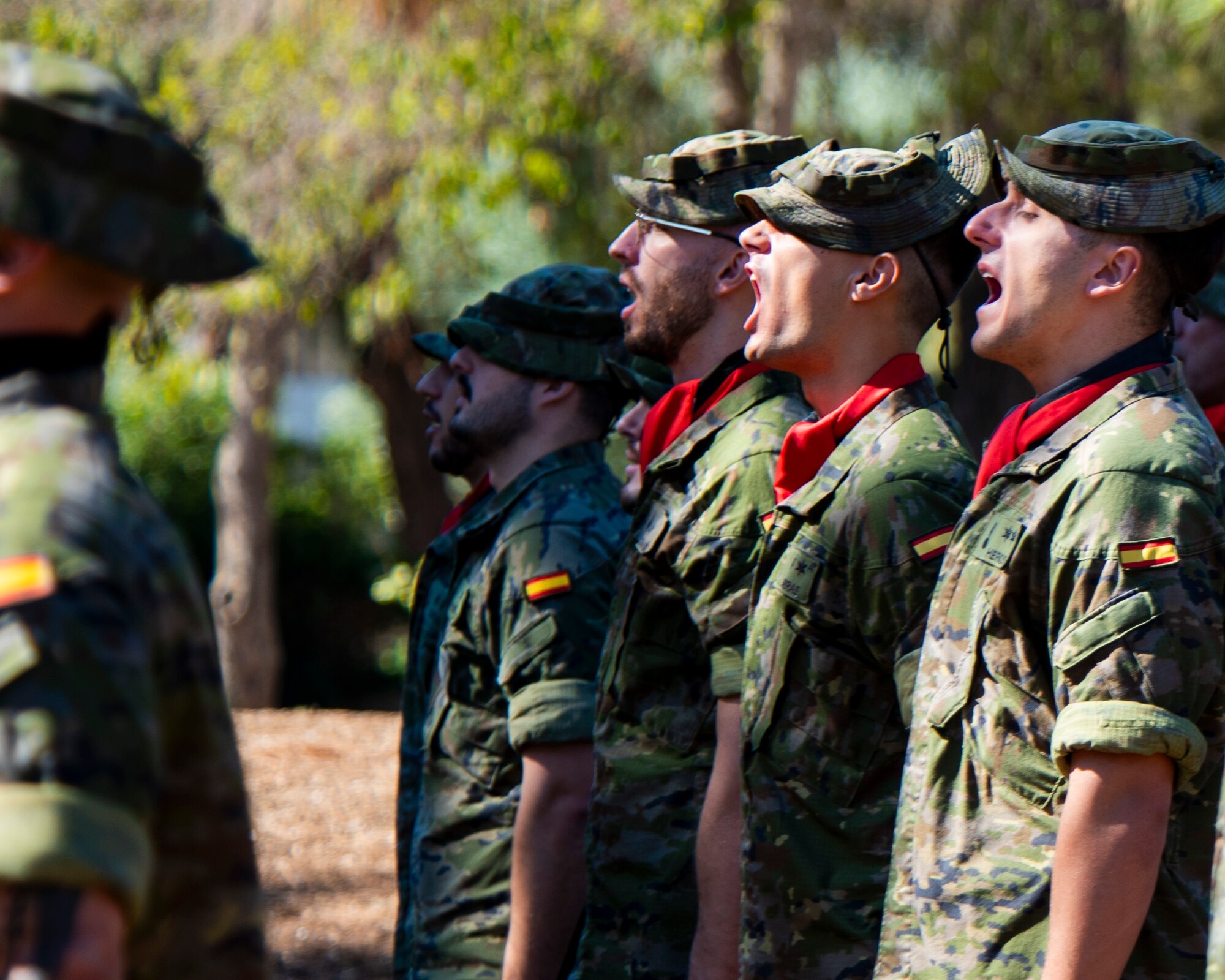 Spanish service members sing