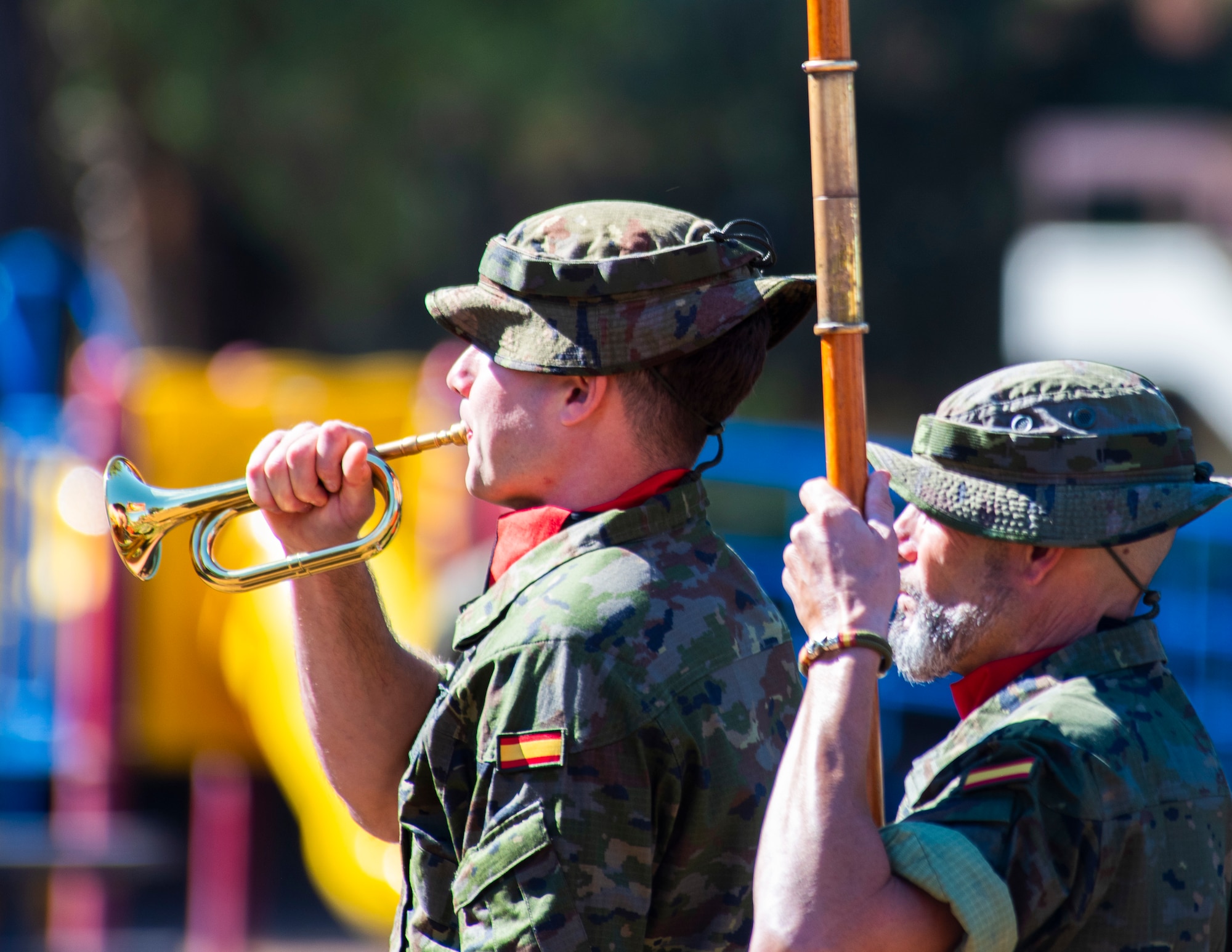 Service member plays a bugle