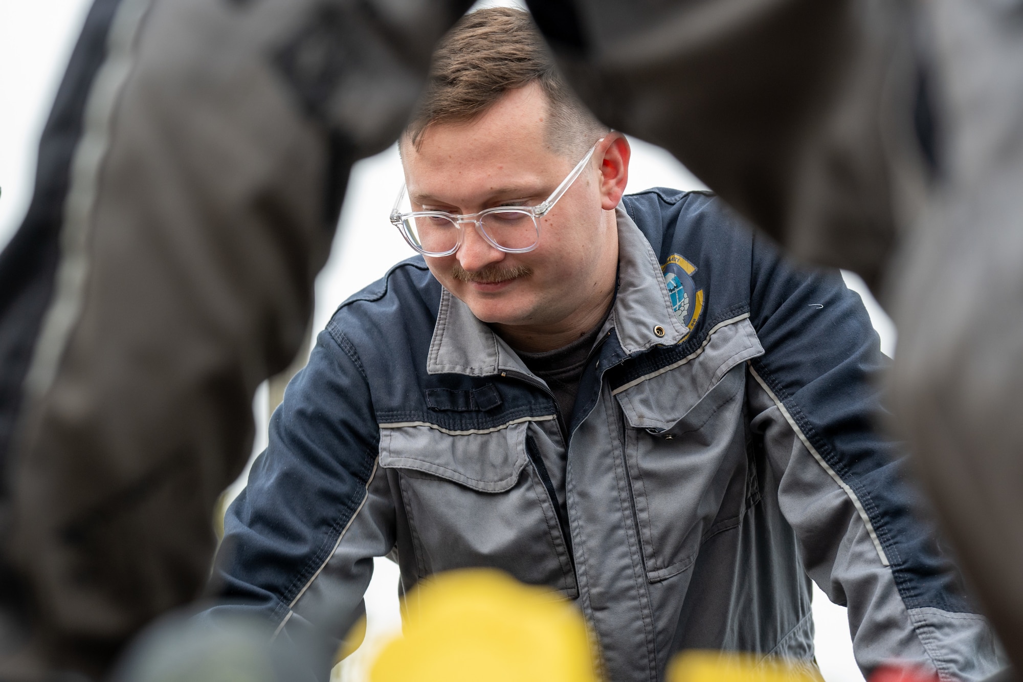Charles Brett, a main workshop mechanic assigned to the 420th Air Base Squadron Logistics Readiness Flight Vehicle Management shop, performs maintenance on a vehicle at RAF Fairford, England, Oct. 16, 2025. The 420th LGRV Vehicle Management shop maintains and repairs vehicles that support aircraft, airfield operations, and base logistics. (U.S. Air Force photo by Airman 1st Class Adam Enbal)