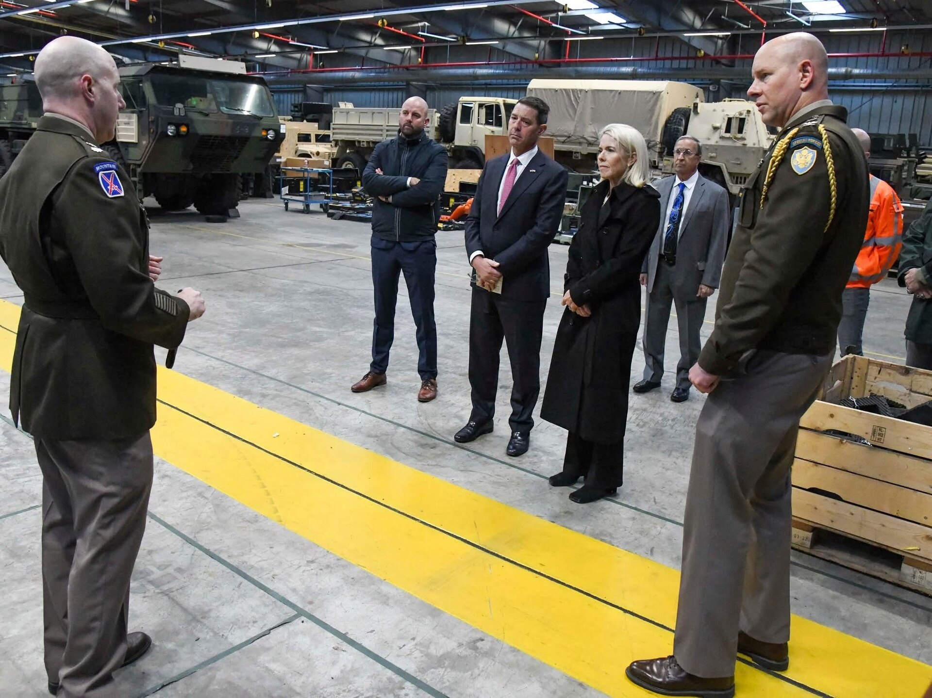 The commander of the 405th Army Field Support Brigade’s Benelux Battalion welcomed the U.S. Ambassador to the Kingdom of the Netherlands and his spouse to the Eygelshoven Army Prepositioned Stocks-2 worksite earlier this week and provided them with a walking tour of the facilities as well as an APS-2 operational briefing.(Photo by Charell de Koster, USAG Benelux PAO)